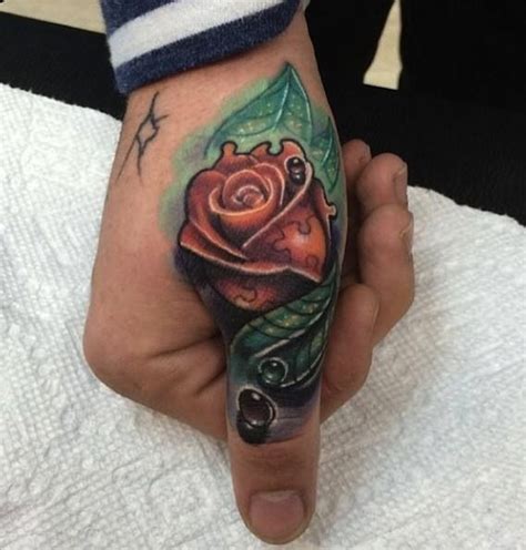 50 Amazing Rose Hand Tattoos
