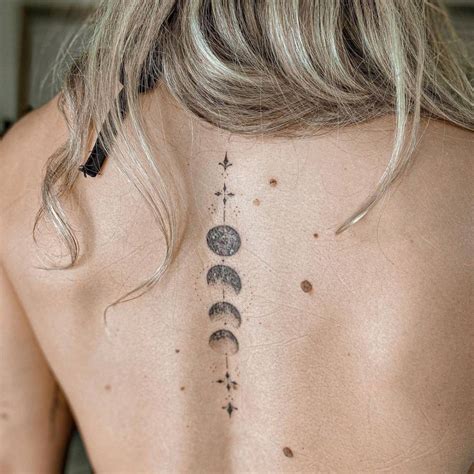 Fine Line Moon Phases Tattoo On The Back