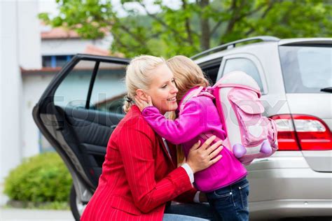Mother Consoling Daughter On First Day At School Stock Image Colourbox