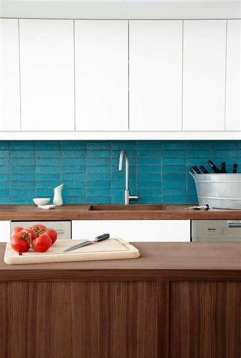 Tara stacked glass mosaic tile, turquoise by ivy hill tile (1) $17.01 /sq ft. This beautiful kitchen has flush white cabinetry, bright ...