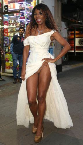 Photo Of Singer Sinitta Flashing Her Panties As She Steps Out In All White High Slit Dress