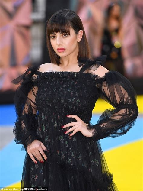 Charli Xcx Ups The Glamour In A Black Lace Dress As She Steps Out For