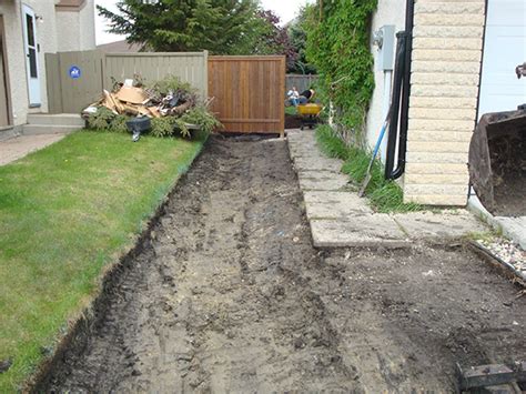 The grass was cool, smelled great. Regrading to improve drainage from back yard | The Lawn Salon