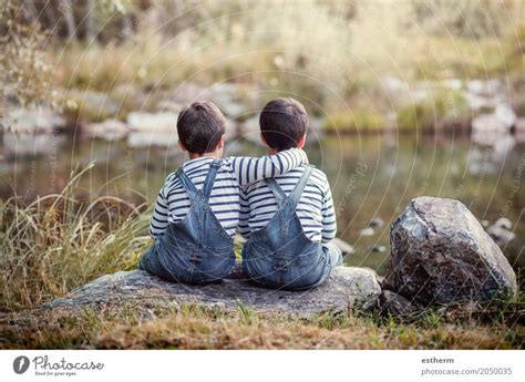 Brother And Sister In Great Hug In Lifestyle Image A Royalty Free
