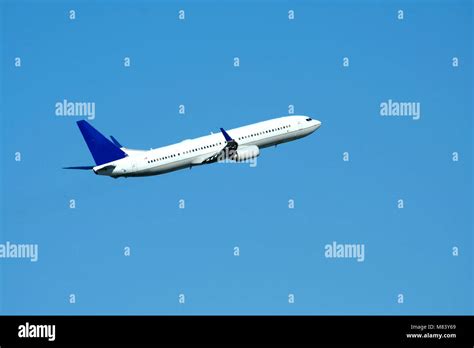 A Passenger Jet Plane Taking Off Stock Photo Alamy