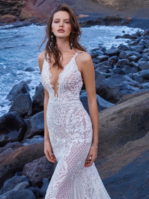 Mermaid Dress With A Deep Plunging V Neckline Made Of A Fully