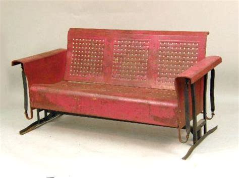 Maybe you would like to learn more about one of these? A VINTAGE RED-PAINTED METAL PORCH SWING GLIDER