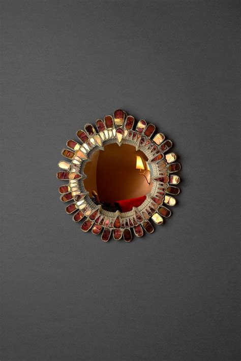 Miroir en talossel et incrustation de miroirs teintés. Miroir "Gerbera rouge" par Line Vautrin, vers 1955. "Gerbera rouge" Mirror by Line Vautrin ...