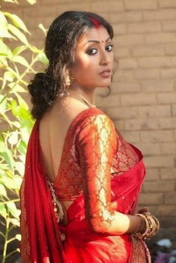 Paoli Dam Hot And Sexy Backless Photos In Red Color Net Saree Veethi