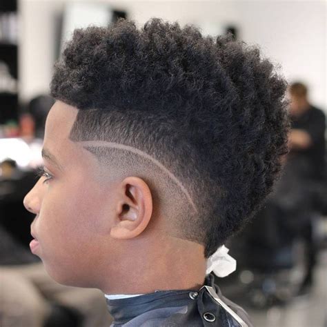 Whether you choose a new hairstyle or a stylish haircut for your boy, the right hair makeover will only make your good looking boy more handsome. 35 Popular Haircuts For Black Boys: 2021 Trends | Black ...