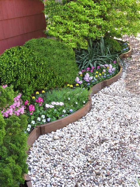 This front yard has few plants meaning they require less or even no pampering. Front Garden Design Ideas Without Grass Front Yard ...