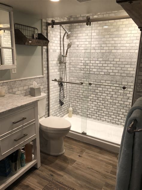 This makes it denser and more durable than ceramic tile. Basement Bathroom, Marble Shower with marble seat in 2020 ...