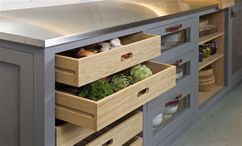 You can design them as a run. One of our freestanding kitchen cabinets with slatted-base ...