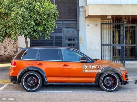 Orange Car Side View Photos And Premium High Res Pictures Getty Images