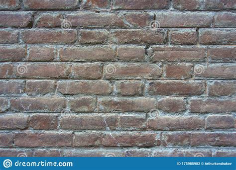 Grungy Aged Old Red Brick Wall With Cracks Texture Background Stock