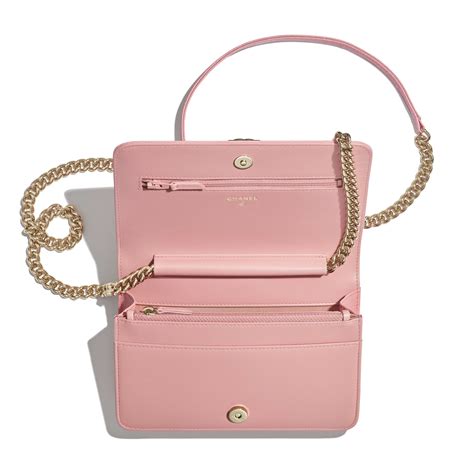 It's compact but it's practical. Grained Calfskin & Gold-Tone Metal Pink BOY CHANEL Wallet ...