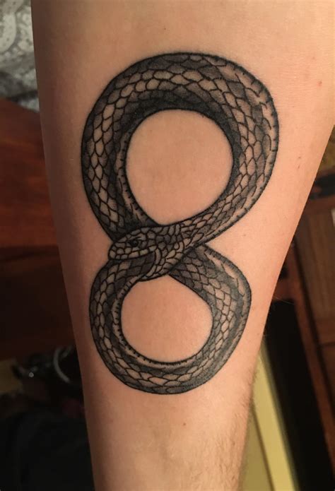 The head of the dragon represents the beginning of life, while the tail as it is being bitten represents the end of life, the circular motion shows. 50+ Ouroboros Tattoo Designs To Evoke That Ancient Spirit ...