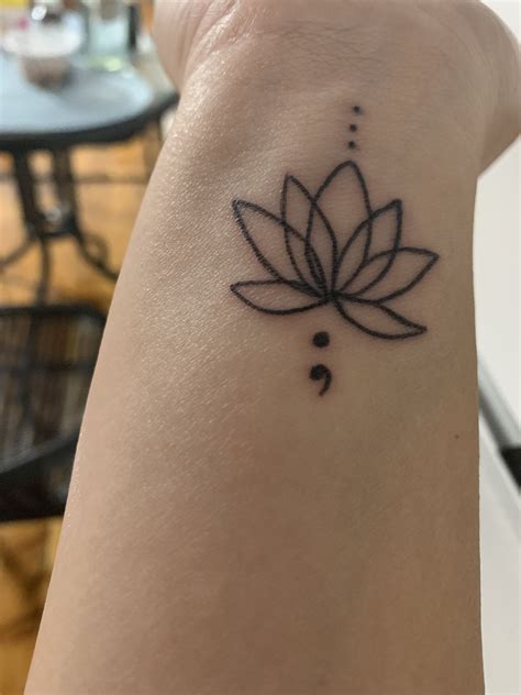 Lotus Flower With Semi Colon Wrist Tattoos For Guys Small Lotus