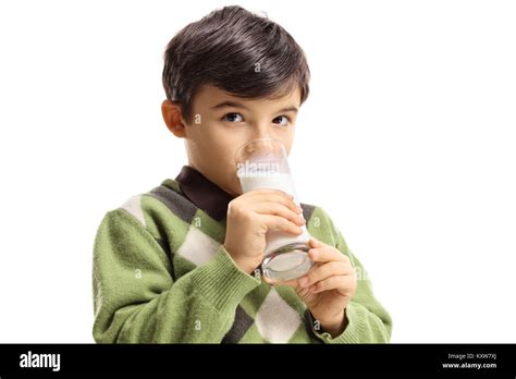 Boy Drinking A Glass Of Milk Isolated On White Background Stock Photo