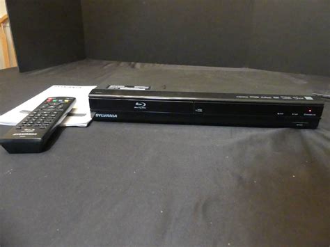 Lot 104 Sylvania Blu Ray Discdvd Player Combo Model Nb620sl1 With