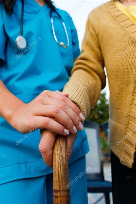 Caring Doctor And Senior Lady Hands Stock Photo By ©lighthunter 31462911