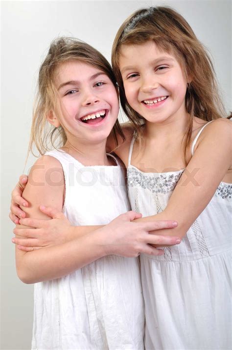 Close Up Portrait Of Two 6 7 Year Old Girls Stock Image Colourbox