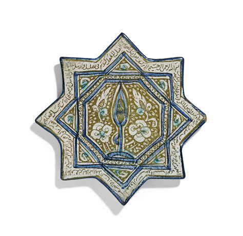 a kashan lustre pottery star tile auctions and price archive
