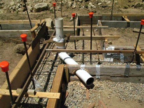 Pipe or conduit through below grade wall. Pipe Stubs Through Footing - Fine Homebuilding