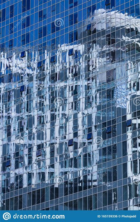 Closeup Reflection Of Buliding In Glass Fasade Of Skyscraper Business