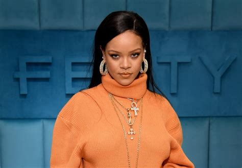The singer also dyed her hair blue, or turquoise and had peacock wings to add to her elaborate ensemble. Rihanna's net worth: Inside singer's £468 million fortune | Metro News