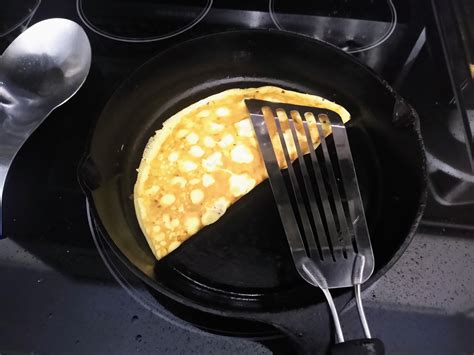 A Non Moving Picture Of A Flipped Omelette In A Very Lightly Oiled Medium Heated Cast Iron