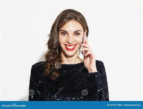 Positive Curly Haired Woman With Red Lips Wearing Evening Modern Dress