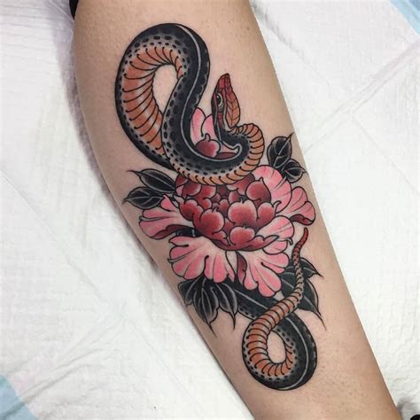 Do you want a traditional design or something more contemporary? 36+ Best Snake And Flower Tattoo Designs & Meanings | PetPress