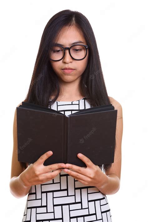 Premium Photo Close Up Of Young Asian Teenage Nerd Girl Reading Book