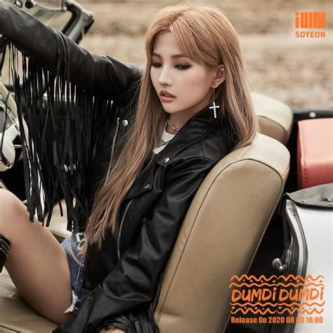 g i dle s soyeon looking chic wearing a black leather jacket in the concept photo for dumdi