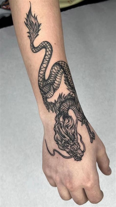 Dragon Tattoo In Dragon Tattoo Wrapped Around Arm Dragon Hand Tattoo Hand Tattoos