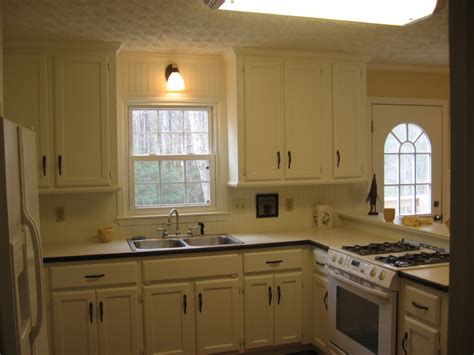 Replacing old cabinets is an expensive undertaking but is much more affordable if you do the installation yourself. painting kitchen cabinets - not realted to other posted ...