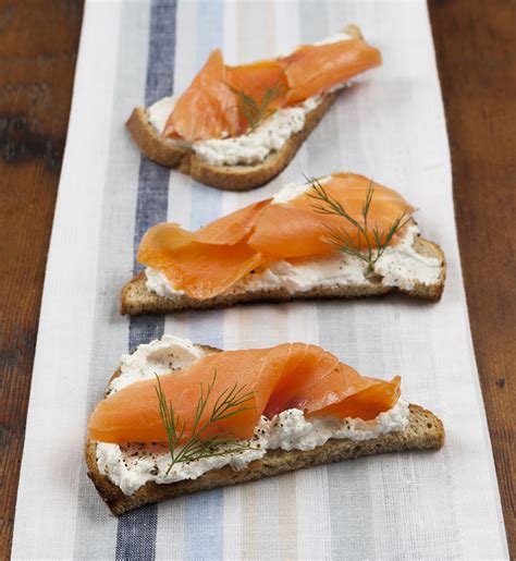 Rye Toast Triangles With Spreadable Goat Cheese Smoked Salmon And Dill