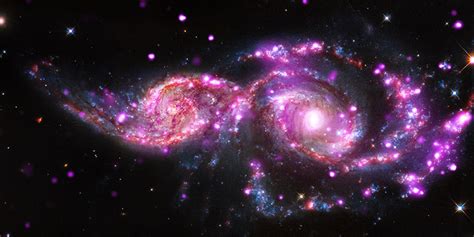 La Collision De Deux Galaxies Donne Un Splendide Spectacle Lumineux à