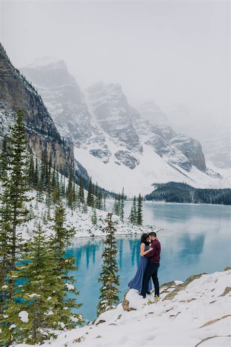 Moraine Lake In October Engagement Photography With Blue Ice And Snow