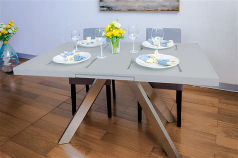 We have you covered with a huge. Exclusive Decor. Camel Glass Top Extendable Dining Table