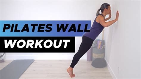 a woman is doing pilates wall workout