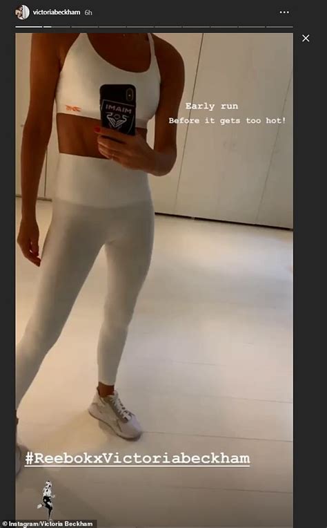 Victoria Beckham Flashes Her Washboard Abs In Tiny White Crop Top