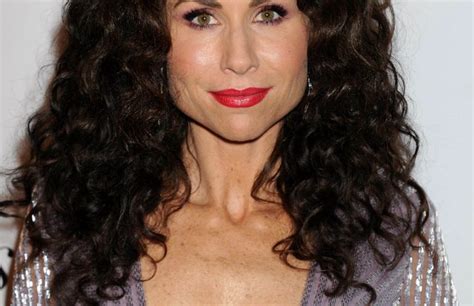 Curly Haired MILF Minnie Driver Sows Her Cleavage In A Seductive Dress