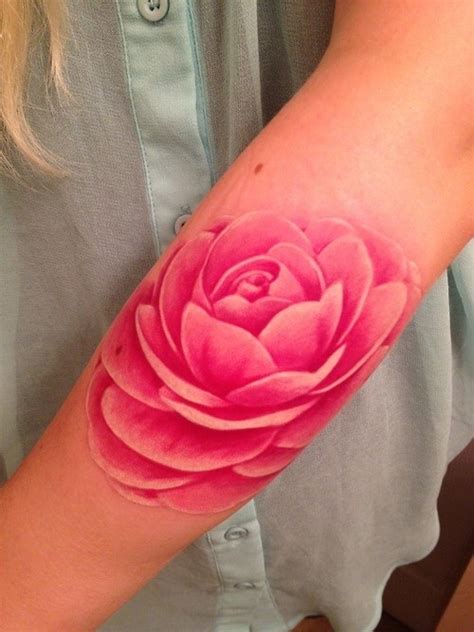 Cute Fantasy Like Pink Colored Big Rose Flower Tattoo On Arm