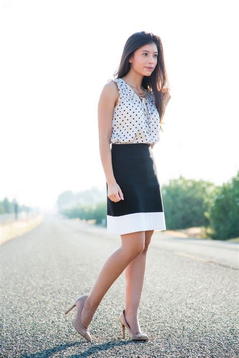 woman wearing polka dots street fashion pencil skirt polka dot crop top t shirt printed
