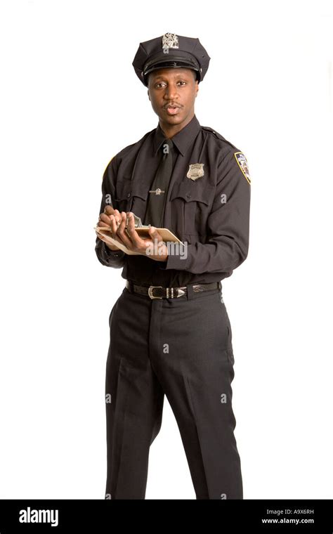 Young Black American Police Officer In Uniform Is Writing On A