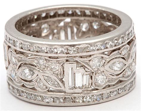 On average, a solitaire engagement ring or wedding band made using 14k white gold will cost 30 to 40% less than the same ring in palladium or platinum. 1950's Wide Diamond Platinum Band image 7 | Jewelry ...