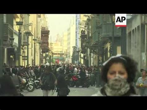 Police Fire Tear Gas At Protesters Opposed To Fujimori S Pardon Youtube