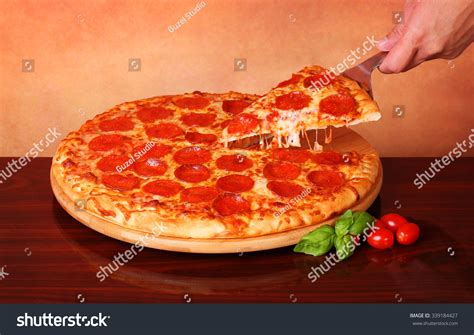Hand Taking Slice Pepperoni Pizza Stock Photo 339184427 Shutterstock